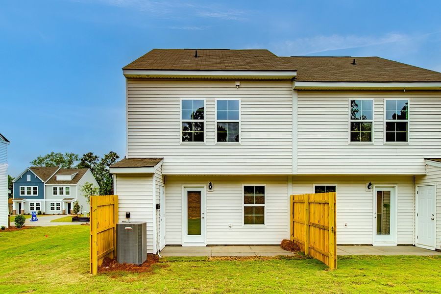 Exterior details and patio area of a home in Padgett Commons, Hopkins (Image 17).