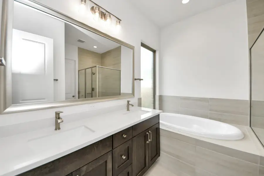 Furnished interior view inside a new home in Marvida, Cypress (Image 8).