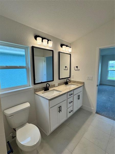 Furnished interior view inside a new home in Watercress Cove, North Port (Image 4).
