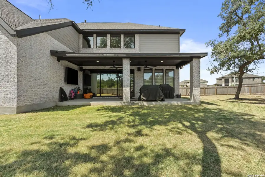 Exterior details and patio area of a home in Kallison Ranch, San Antonio (Image 22).