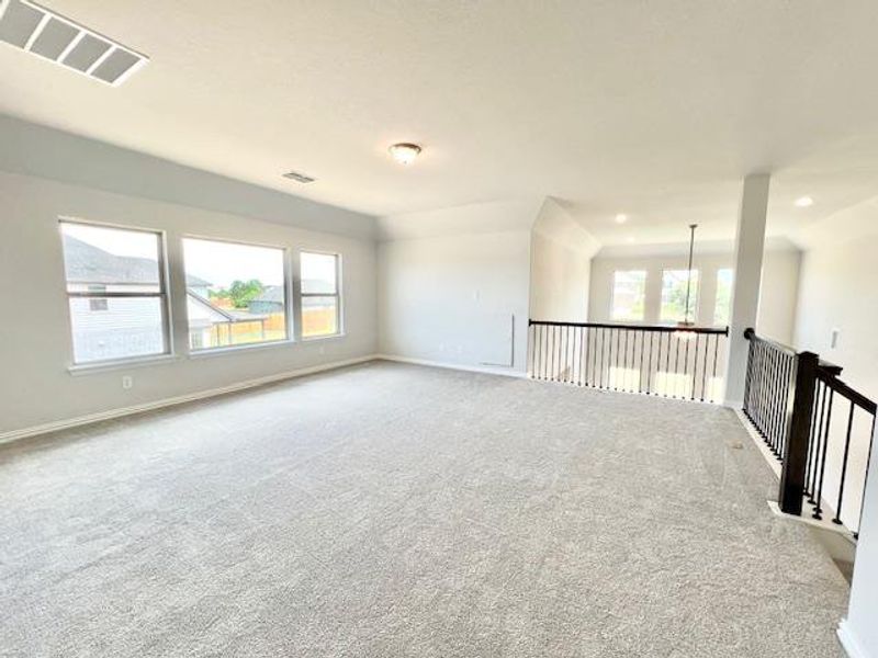Spare room featuring carpet and recessed lighting Spare room featuring carpet and recessed lighting