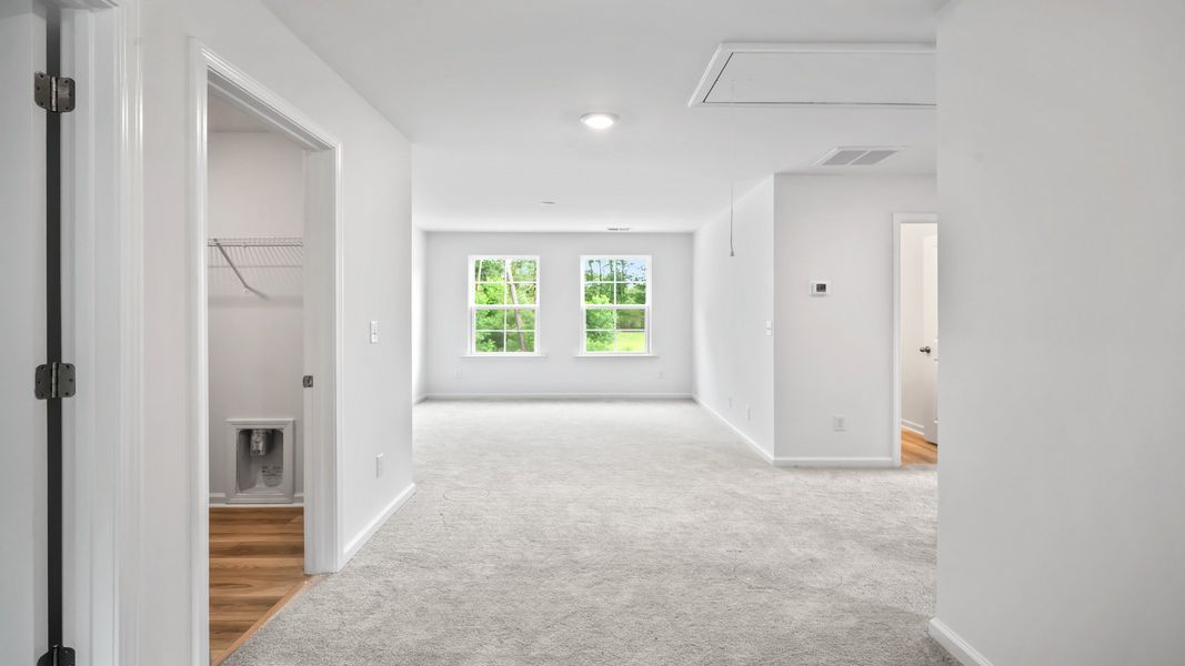 Versatile upstairs loft adds flexible living space