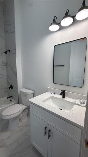 Furnished interior view inside a new home in , Port Charlotte (Image 10).