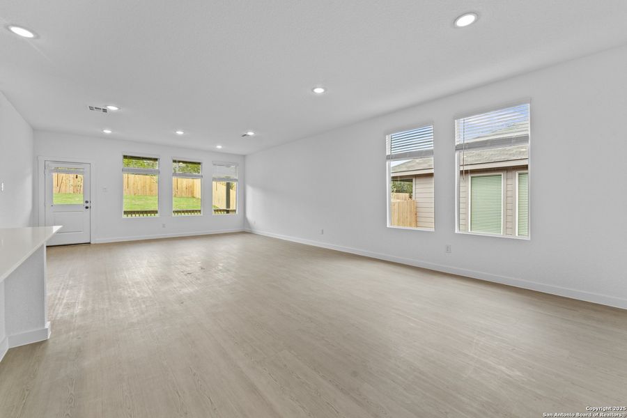 Spacious, unfurnished interior of a new home in Waterwheel: Coastline Collection, San Antonio (Image 18).