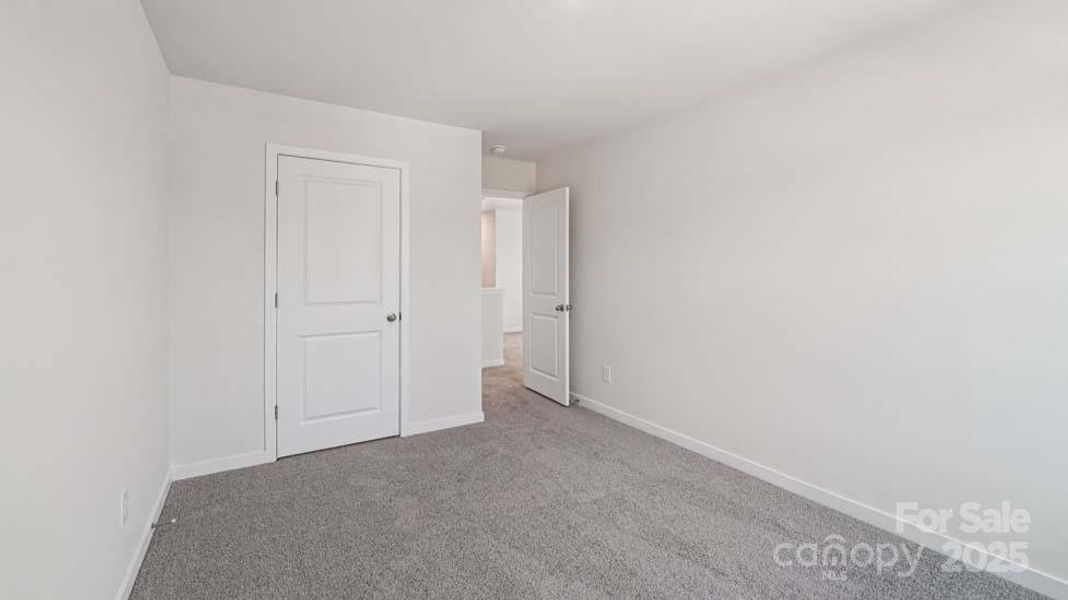 Spacious, unfurnished interior of a new home in Cardinal Creek, Charlotte (Image 20).