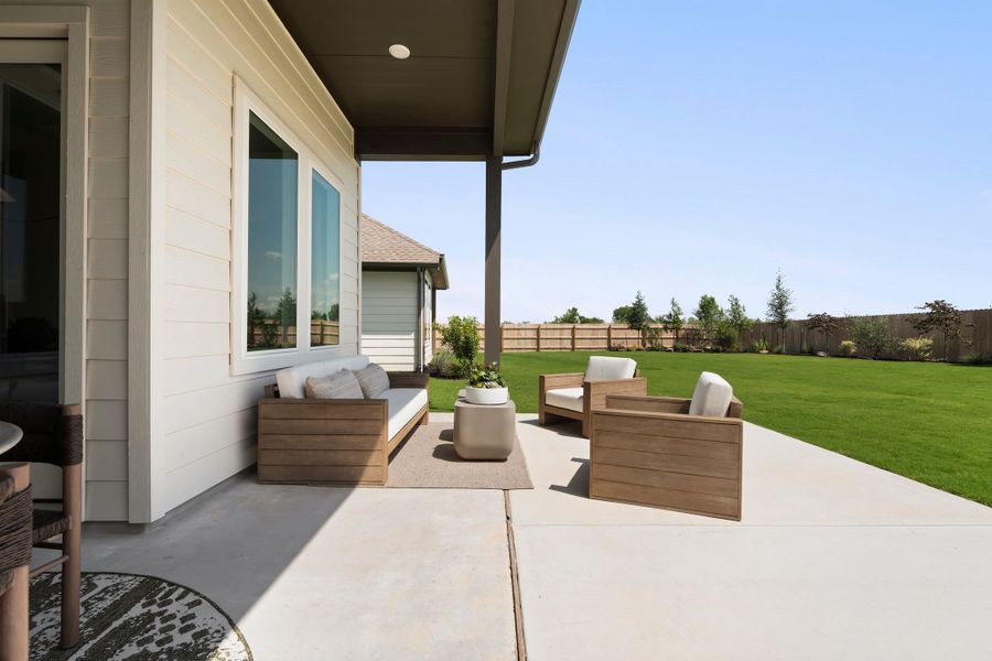 Exterior details and patio area of a home in Heritage, Dripping Springs (Image 3).
