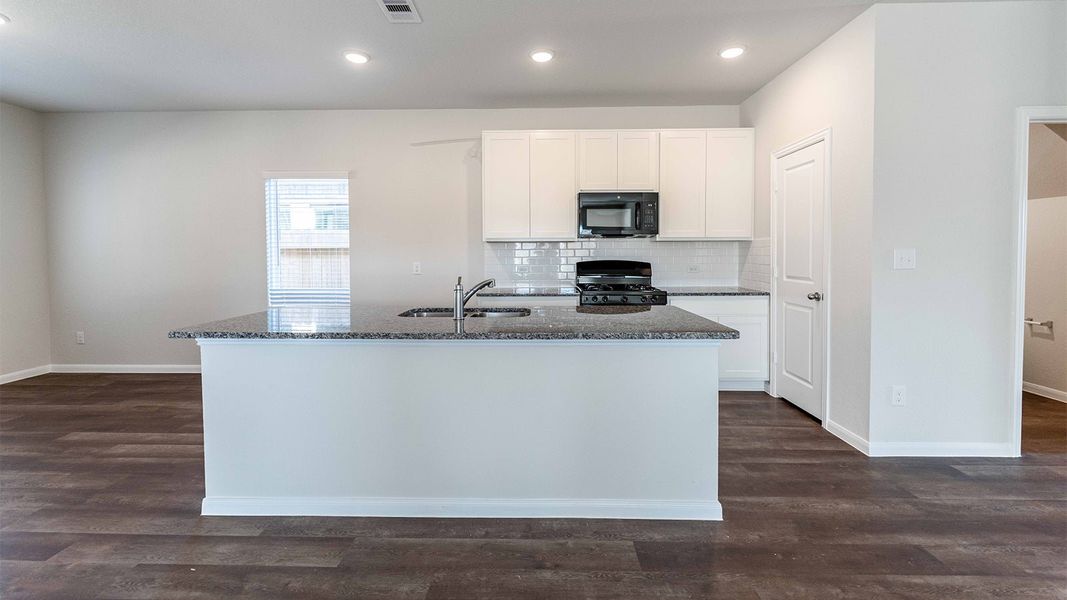 Furnished interior view inside a new home in The Canopies, Splendora (Image 5).