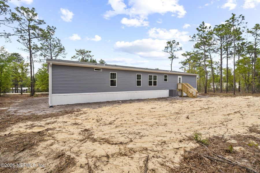 Exterior details and patio area of a home in , Hawthorne (Image 26).