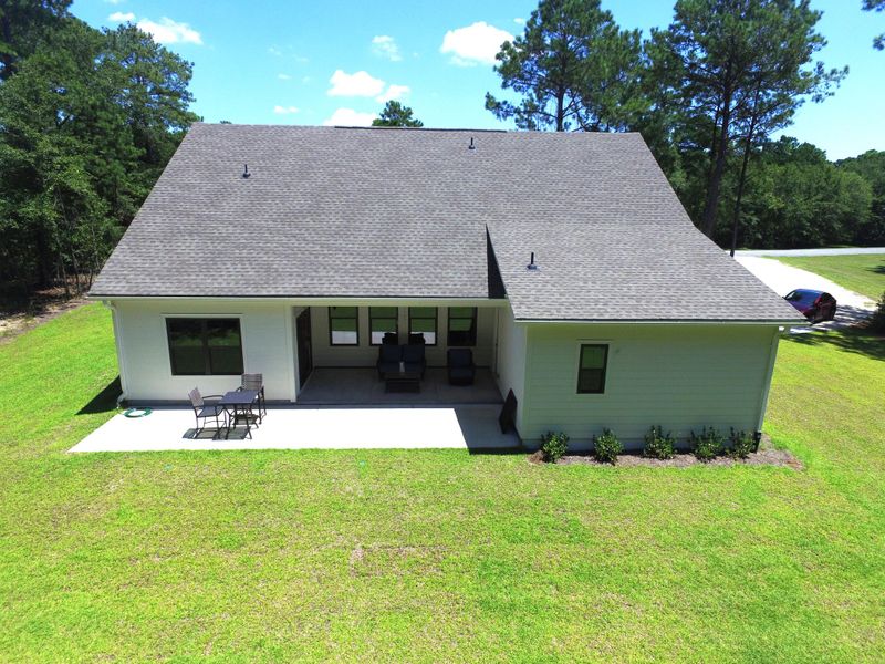 Exterior details and patio area of a home in , Awendaw (Image 26).