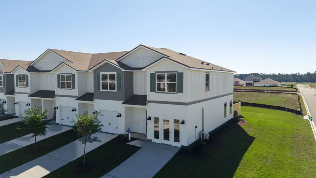 Front exterior of a new home in Abilene Acres, Tallahassee, FL, highlighting curb appeal (Image 28).