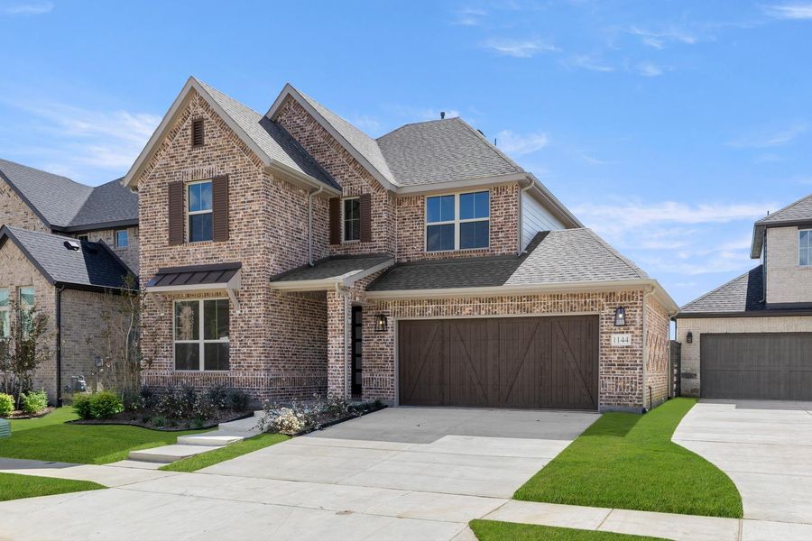 Front exterior of a new home in Garden Collection at Union Park, Little Elm, TX, highlighting curb appeal (Image 1).