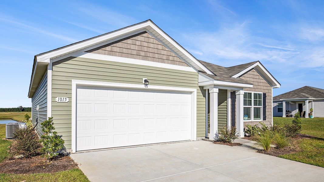 Front exterior of a new home in Ridgefield, Conway, SC, highlighting curb appeal (Image 2).