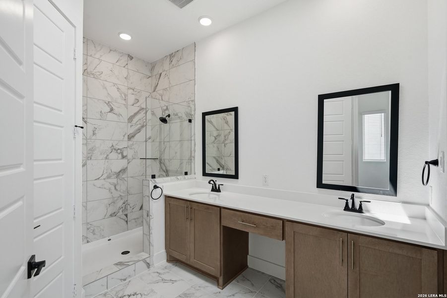 Furnished interior view inside a new home in Centero at Stone Oak, San Antonio (Image 12).