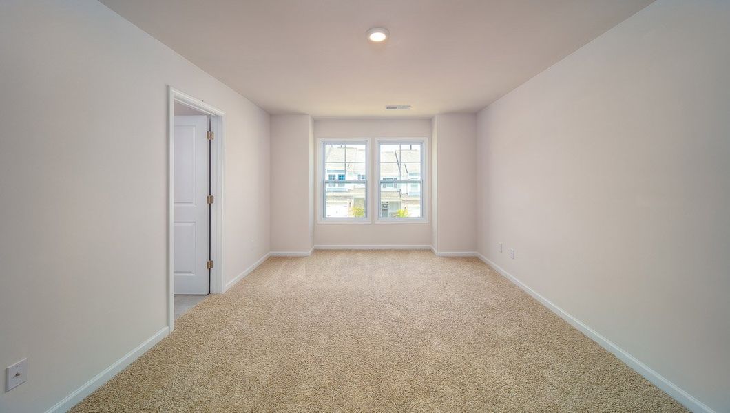 Spacious, unfurnished interior of a new home in Townes at Tap Root Farms, Fletcher (Image 19). Spacious, unfurnished interior of a new home in Townes at Tap Root Farms, Fletcher (Image 19).