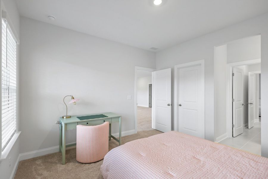 Furnished interior view inside a new home in Tidewater at Lakes of Cane Bay, Summerville (Image 42).