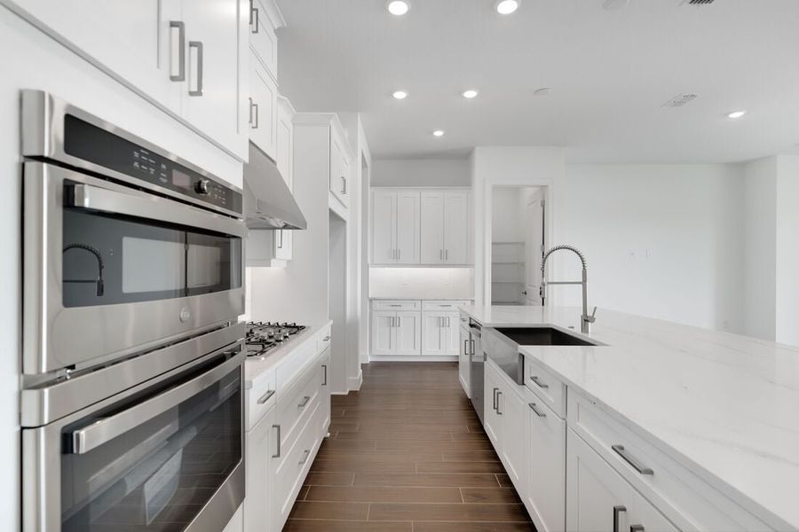Representative furnished interior of a home built from the Ambra by Taylor Morrison in Esplanade at Center Lake Ranch, St. Cloud (Image 4).