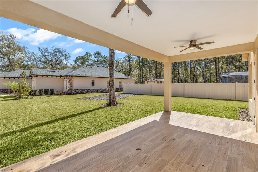 Exterior details and patio area of a home in , Orange City (Image 24).