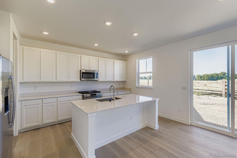 Furnished interior view inside a new home in Vermilion Creek: The Pioneer Collection, Centennial (Image 3).