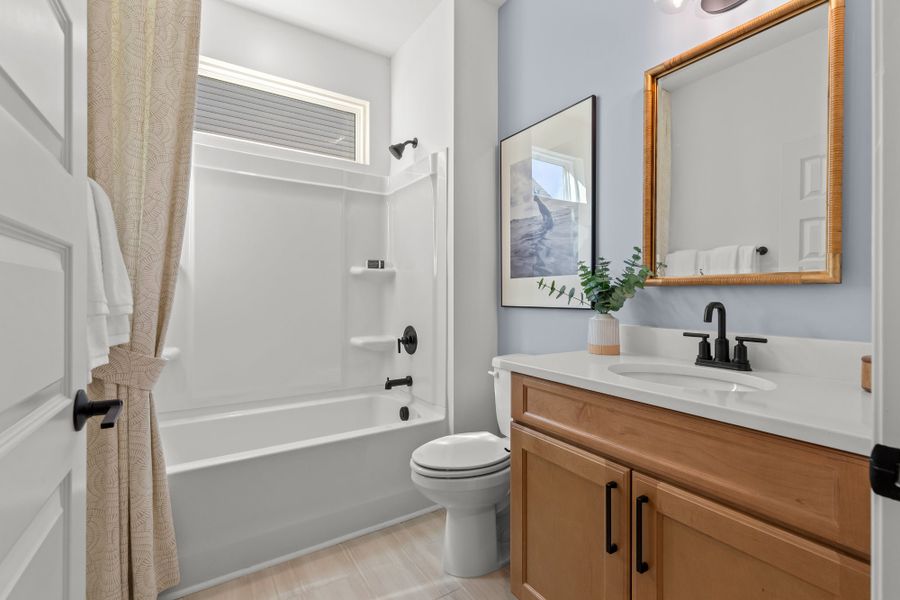 Representative furnished interior of a home built from the The Surfrider by Chesapeake Homes in Coastal Club of the Carolinas, Calabash (Image 61).
