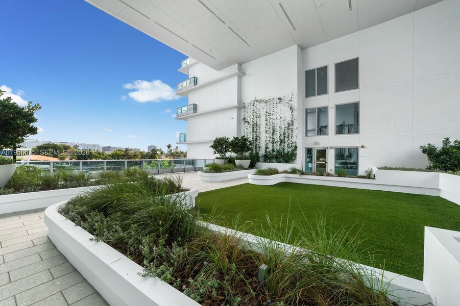 Exterior details and patio area of a home in , Bay Harbor Islands (Image 28).