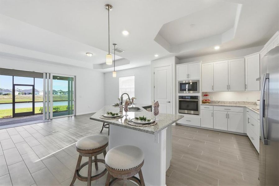 Furnished interior view inside a new home in Heritage Landing, Punta Gorda (Image 17).