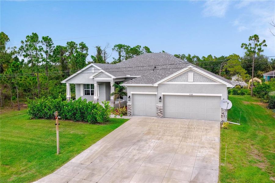 Front exterior of a new home in , Port Charlotte, FL, highlighting curb appeal (Image 23).