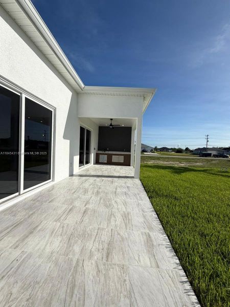Front exterior of a new home in , Cape Coral, FL, highlighting curb appeal (Image 18).
