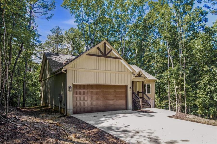Front exterior of a new home in , Ellijay, GA, highlighting curb appeal (Image 2). Front exterior of a new home in , Ellijay, GA, highlighting curb appeal (Image 2).