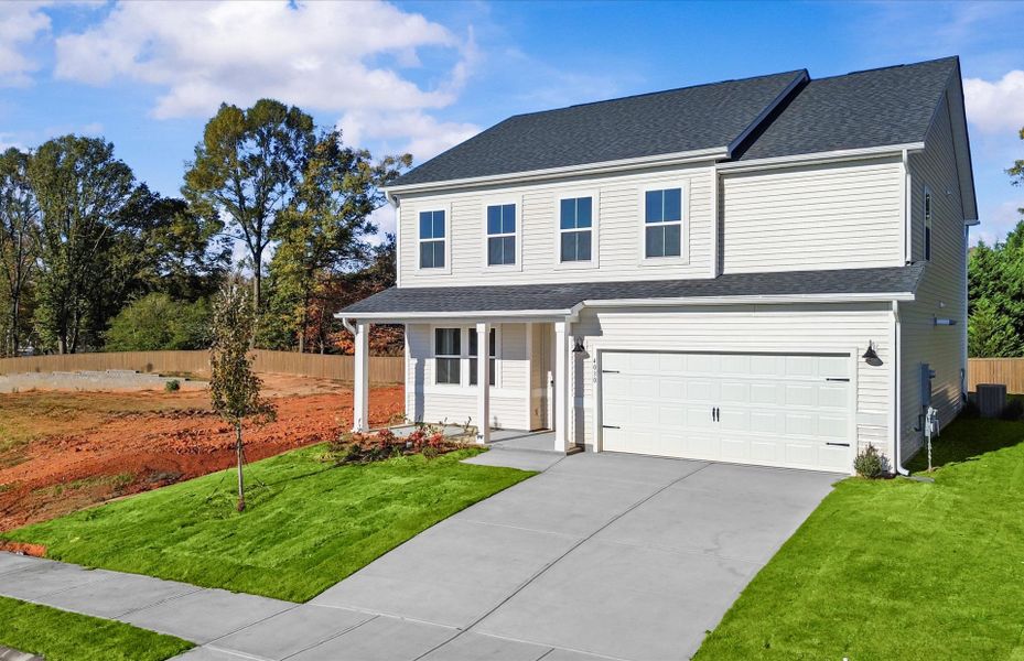 Front exterior of a new home in Sparrow Creek, Boiling Springs, SC, highlighting curb appeal (Image 1).