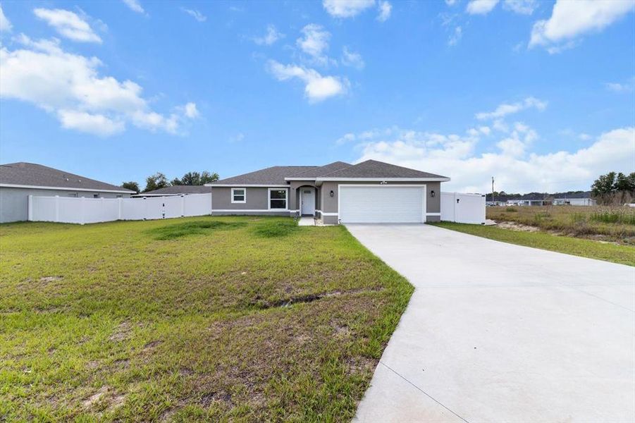Front exterior of a new home in , Ocala, FL, highlighting curb appeal (Image 19).
