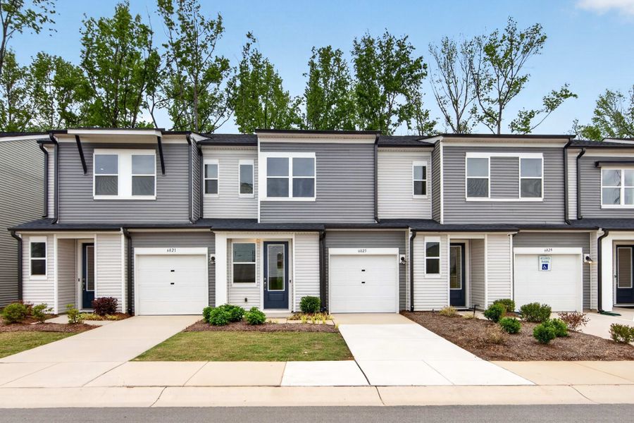 Front exterior of a new home in Fifteen 15 Cannon, Charlotte, NC, highlighting curb appeal (Image 1). Front exterior of a new home in Fifteen 15 Cannon, Charlotte, NC, highlighting curb appeal (Image 1).