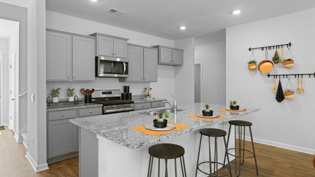 Furnished interior view inside a new home in Pine Hills at Cane Bay, Summerville (Image 35).