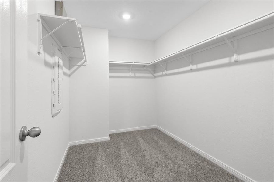 Look at this immaculate closet! With high shelving, multiple rows to hang clothing, you are sure to have enough room for all your belongings!