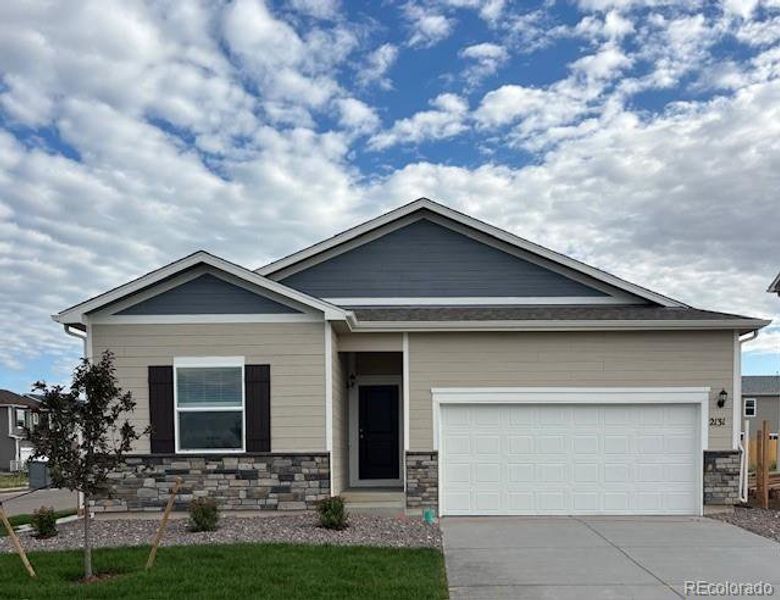 Front exterior of a new home in Cottonwood Greens, Fort Lupton, CO, highlighting curb appeal (Image 15). Front exterior of a new home in Cottonwood Greens, Fort Lupton, CO, highlighting curb appeal (Image 15).