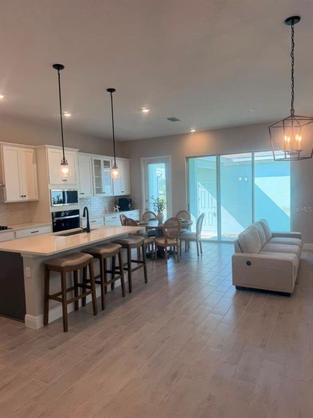 Furnished interior view inside a new home in , Winter Garden (Image 11).