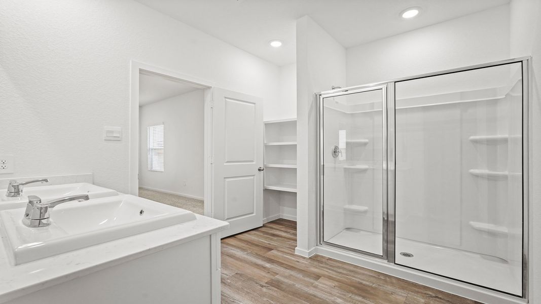 Furnished interior view inside a new home in Sunterra, Katy (Image 9).