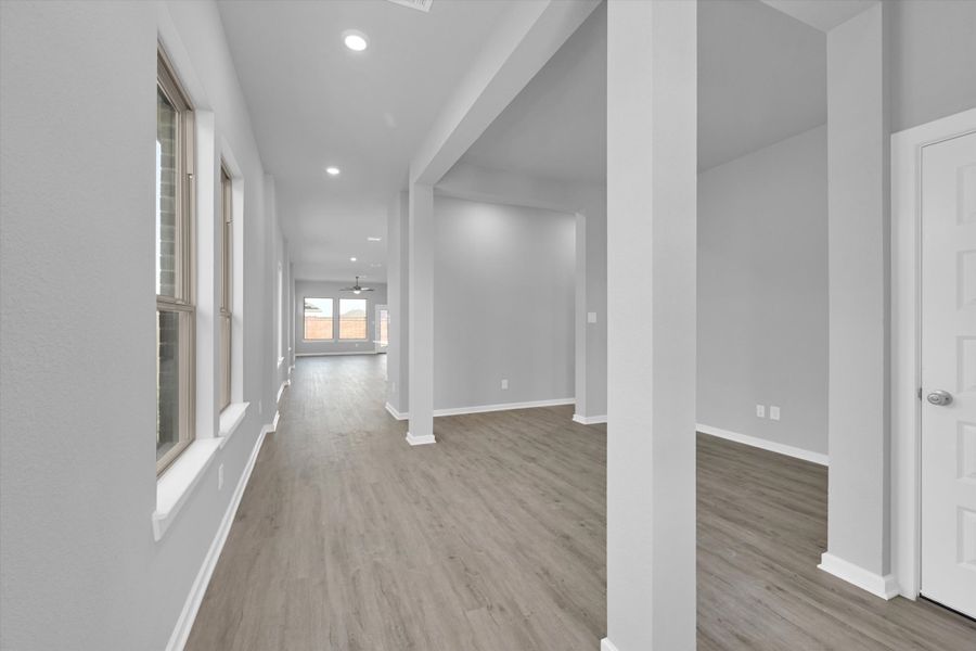 Spacious, unfurnished interior of a new home in Sunterra 40, Katy (Image 15).