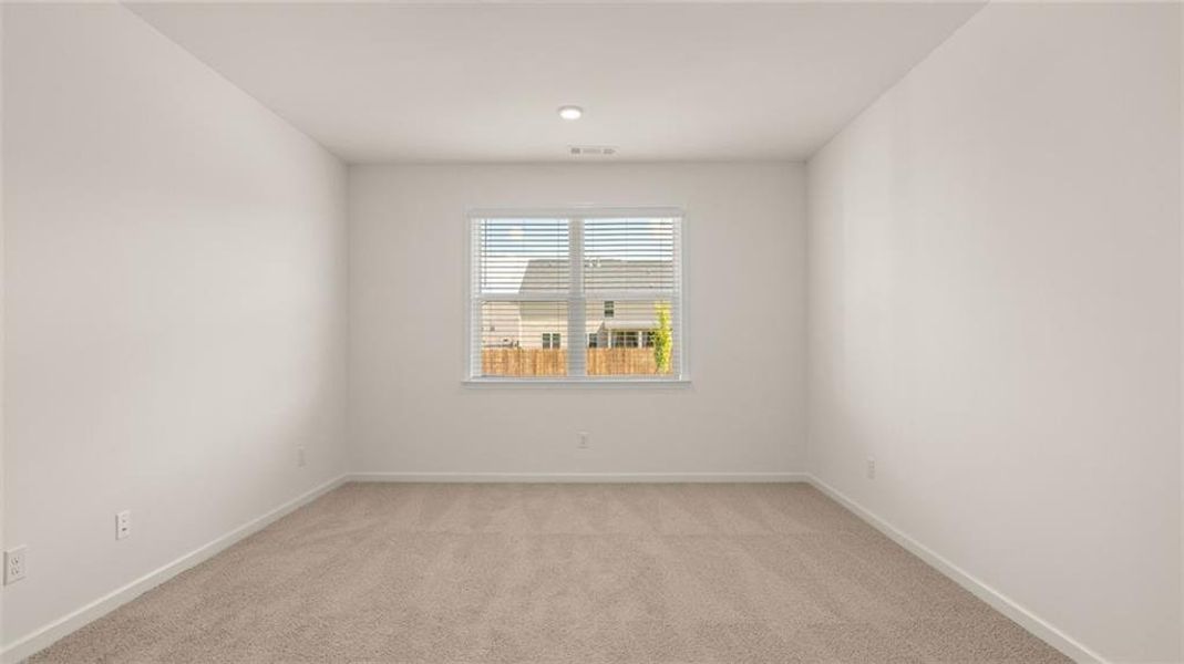 Spacious, unfurnished interior of a new home in The Preserve at Agricultural Village, Perry (Image 27).