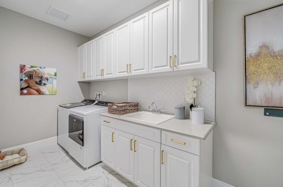 Furnished interior view inside a new home in Tesoro Club, Port St. Lucie (Image 10).