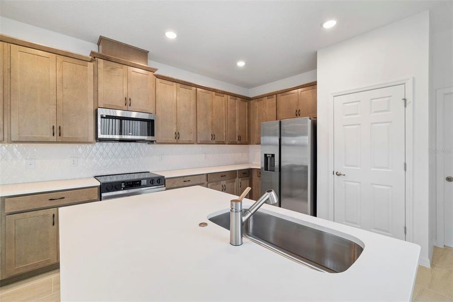 Furnished interior view inside a new home in Cypress Bluff, Groveland (Image 8). Furnished interior view inside a new home in Cypress Bluff, Groveland (Image 8).