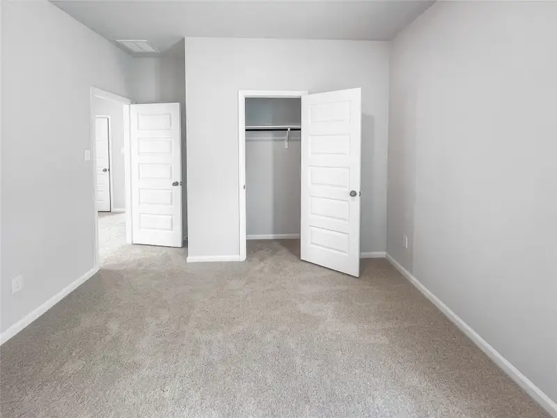 The Waring III- Bedroom 2. Sample image for illustration; upgrades, options, and colors may vary.