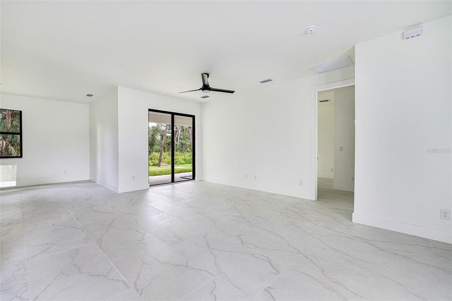 Spacious, unfurnished interior of a new home in , Port Charlotte (Image 21).