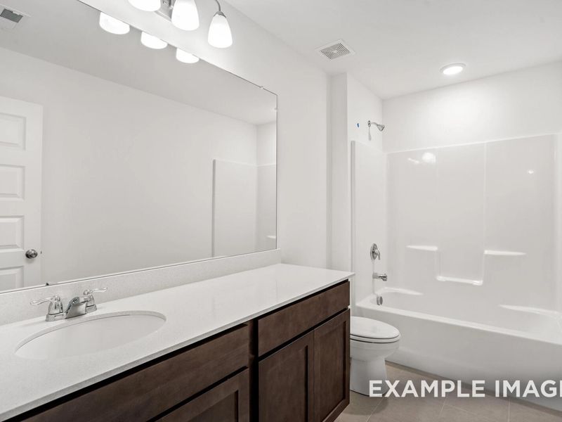 Representative furnished interior of a home built from the The Grayson A by Davidson Homes LLC in Sage Farms, White House (Image 18).