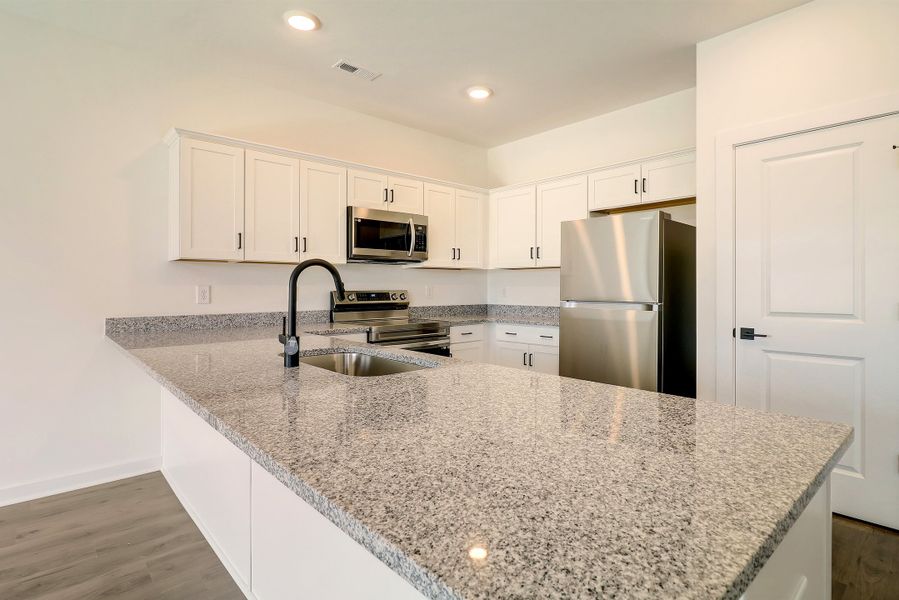 Representative furnished interior of a home built from the Ivey by Hunter Quinn Homes in Westgate Village Townes, Spartanburg (Image 6). Representative furnished interior of a home built from the Ivey by Hunter Quinn Homes in Westgate Village Townes, Spartanburg (Image 6).