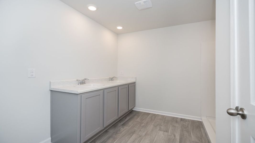 Representative unfurnished interior of a home built from the ARIA by D.R. Horton in The Meadows at Wildwood Village, Shallotte (Image 31). Representative unfurnished interior of a home built from the ARIA by D.R. Horton in The Meadows at Wildwood Village, Shallotte (Image 31).