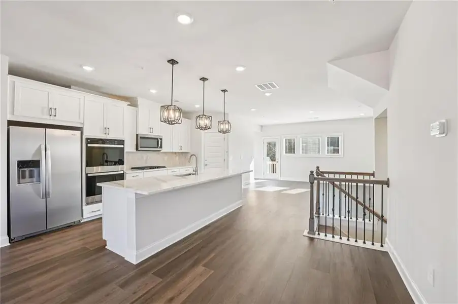 Furnished interior view inside a new home in , Cumming (Image 19).