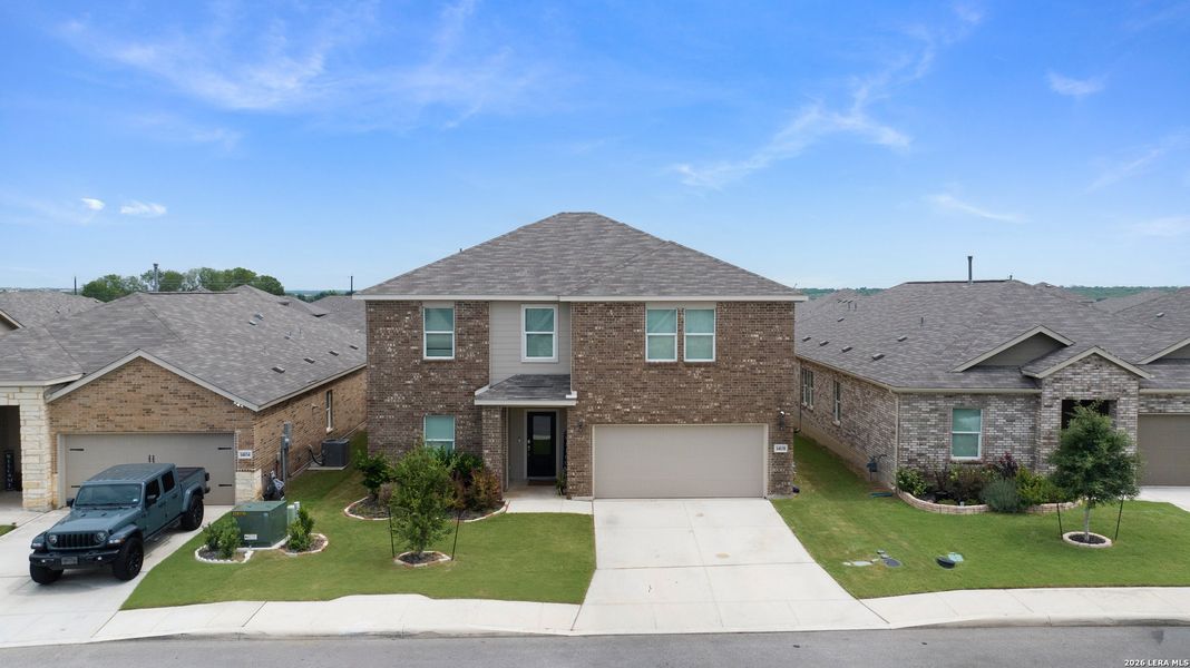 Front exterior of a new home in Brookmill, San Antonio, TX, highlighting curb appeal (Image 1). Front exterior of a new home in Brookmill, San Antonio, TX, highlighting curb appeal (Image 1).