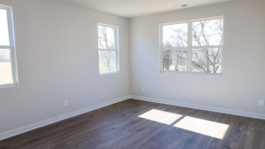 Representative unfurnished interior of a home built from the STONEBROOK II by D.R. Horton in Harvest Point, Spring Hill (Image 44).