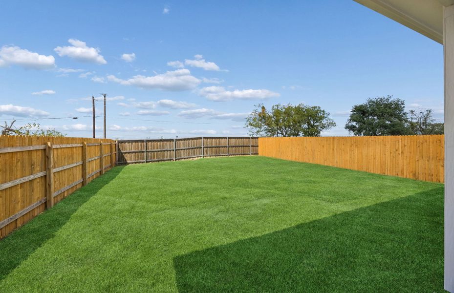 Exterior details and patio area of a home in Crosswinds, Kyle (Image 3).