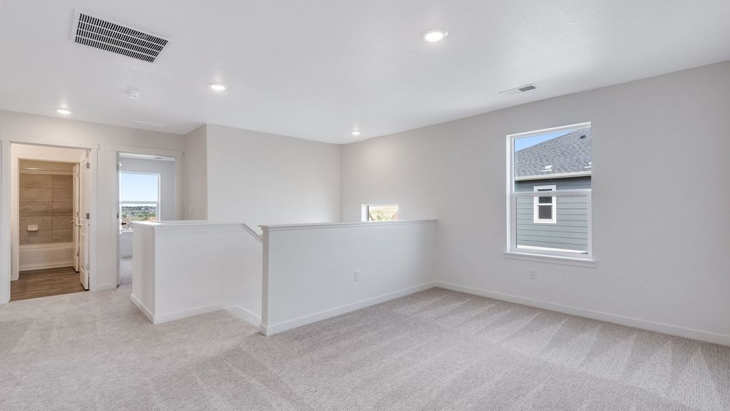 Spacious, unfurnished interior of a new home in Trails at Crowfoot, Parker (Image 18). Spacious, unfurnished interior of a new home in Trails at Crowfoot, Parker (Image 18).